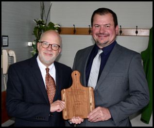 photo of Philip Freeburg receiving award from Dean Karl Martin